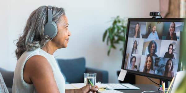 Woman attending a zoom work call: Finding Opportunity in Crisis