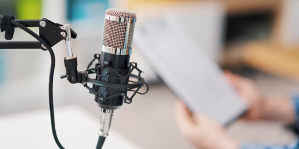 Microphone recording someone speaking: Open Source Software and Digital Transformation