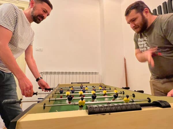 Cristi and Soren taking a break from FavCreate to play some Foosball