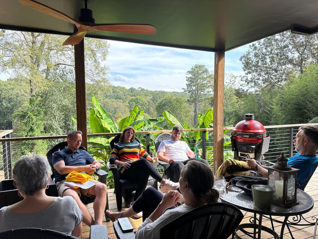 The Crowd Favorite team relaxing by the lake in Atlanta during the company retreat