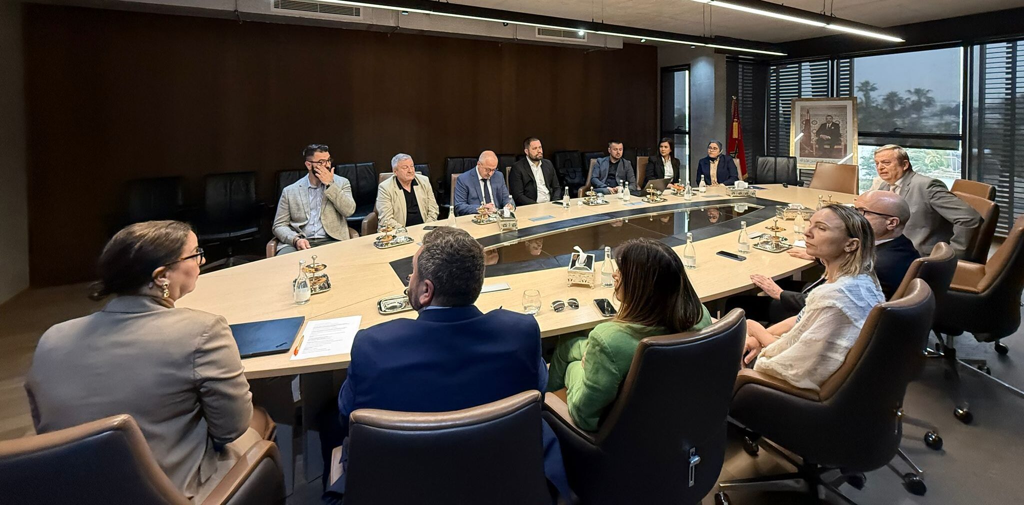 People sitting around a table in a meeting